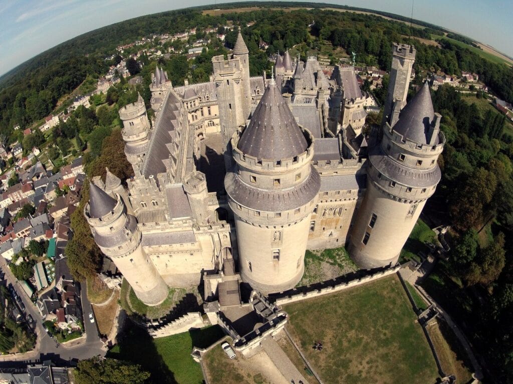 Château de Pierrefonds 2 Fisheye aerial view of Pierrefonds showing the full ring of towers and the village below