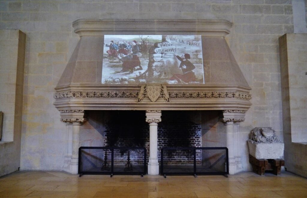 Château de Pierrefonds 6 The monumental fireplace of the Salle des Gardes at Pierrefonds, carved with fleur-de-lis