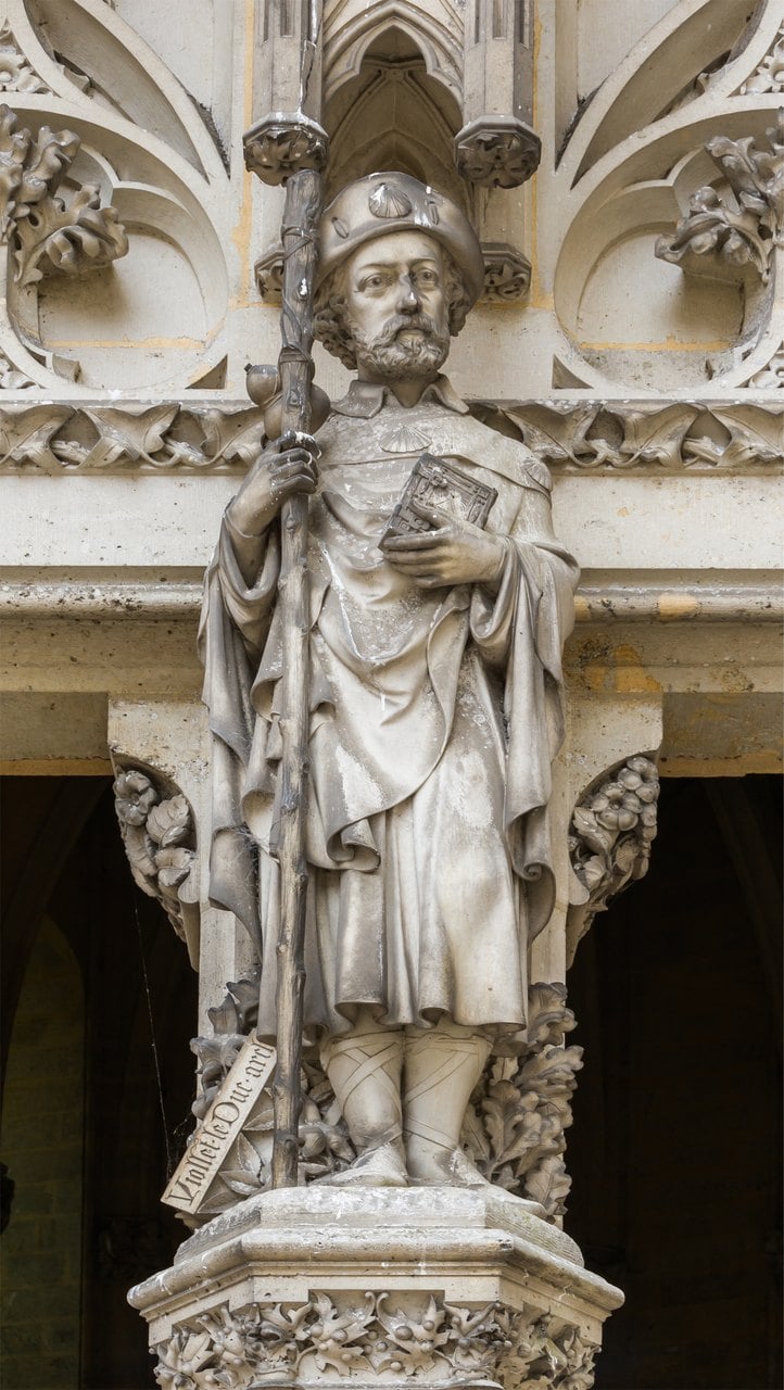 Viollet-le-Duc as Saint James the pilgrim — Jebulon, CC0 Stone statue of Viollet-le-Duc carved as Saint James the pilgrim, with scallop shells, staff and a signed scroll