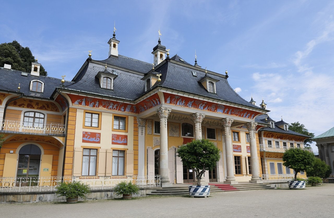 Castles of Saxony 7 The Bergpalais at Pillnitz, with curving chinoiserie roofs and a painted facade facing the garden.