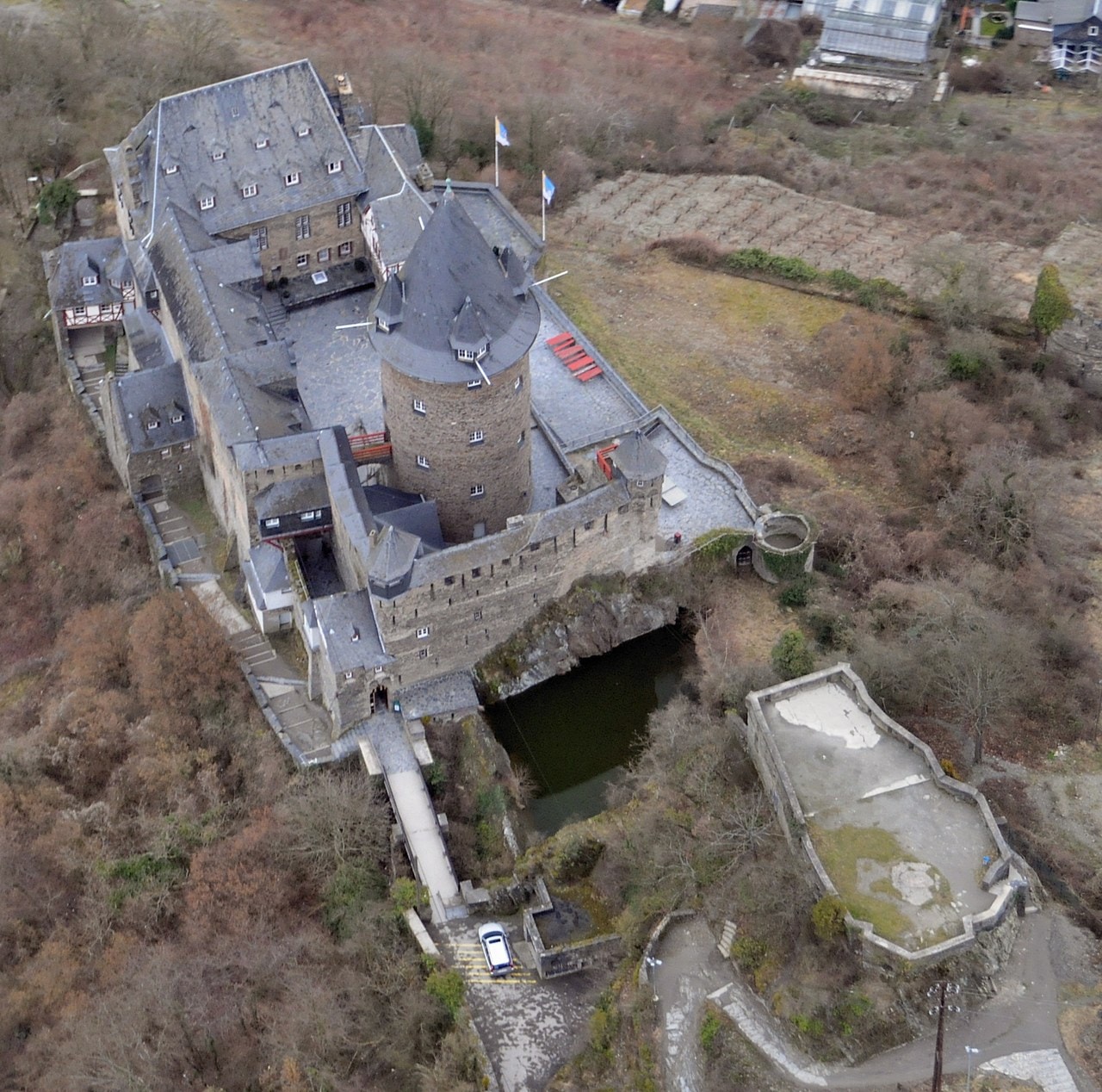 Stahleck Castle 6 Aerial view of Stahleck Castle showing its spring-fed water moat in the rock-cut ditch.
