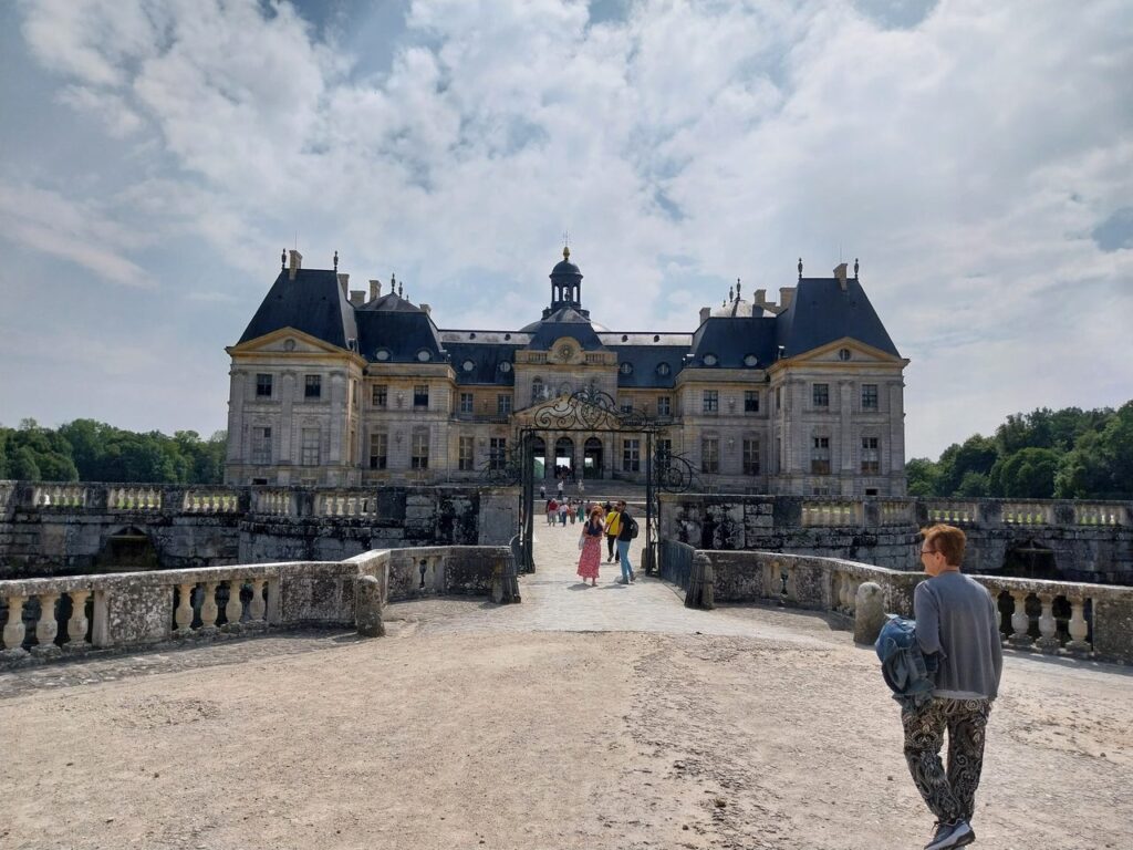 The entrance front of Vaux-le-Vicomte seen across the moat bridge