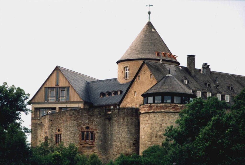 The keep and modern glass bay of Waldeck Castle