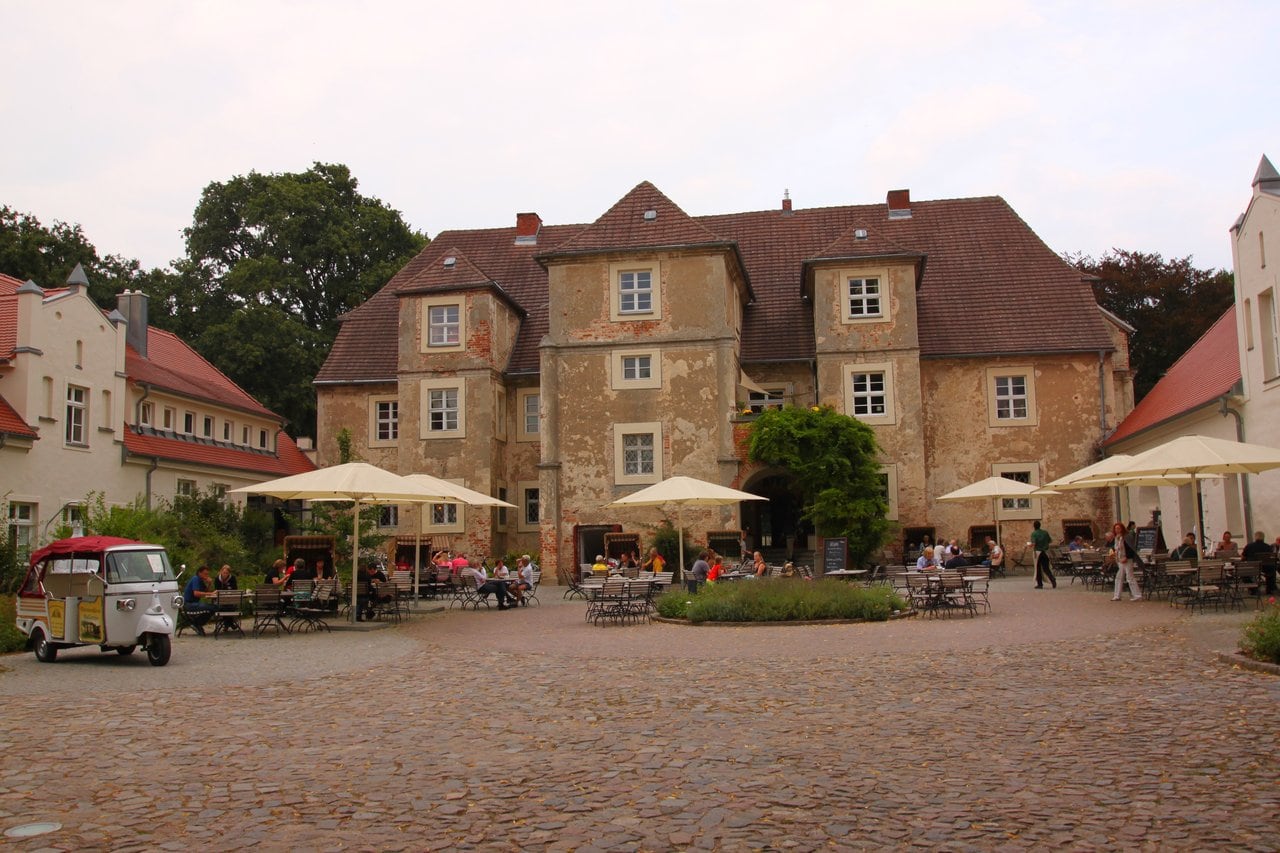 Castle Hotels in Germany: Where You Can Actually Sleep Inside the History 9 Wasserschloss Mellenthin on Usedom, its courtyard and restaurant