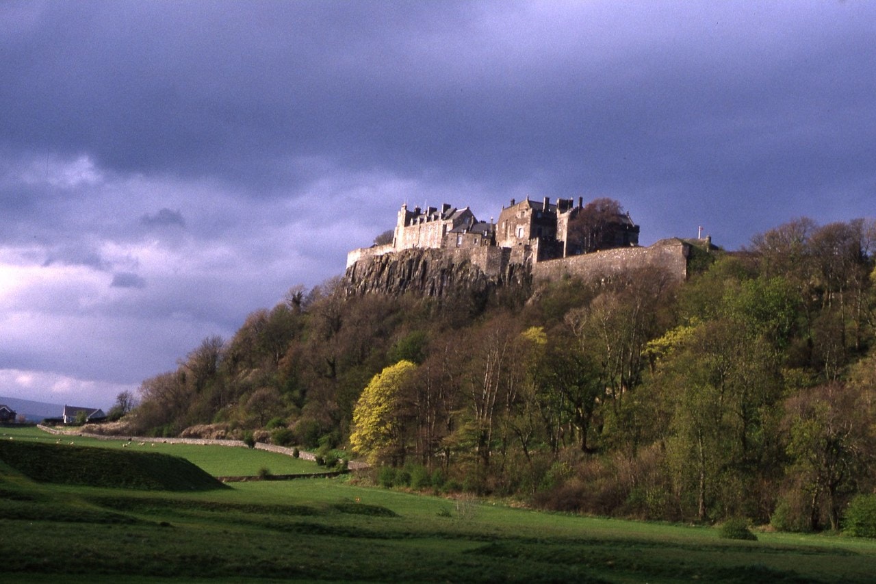 Stirling Castle 1 Stirling Castle crowns its volcanic crag above the valley, seen from the King's Knot below.