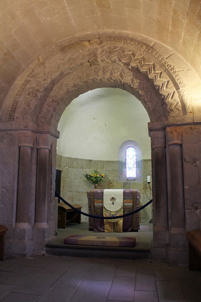 Inside St Margaret's Chapel, the castle's oldest surviving building, a chevron-carved Romanesque arch frames the rounded apse and its little altar. Inside St Margaret's Chapel, the castle's oldest surviving building, a chevron-carved Romanesque arch frames the rounded apse and its little altar.