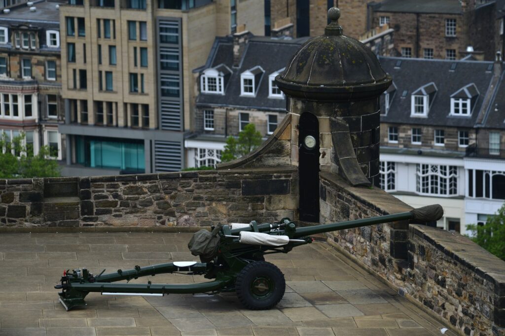 Edinburgh Castle 5 The One O'Clock Gun stands ready on Mills Mount Battery, the small clock-turret behind it, overlooking the New Town rooftops.