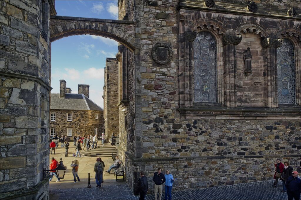 Edinburgh Castle 7 The entrance to Crown Square passes beneath a flying arch, beside the tall stained-glass windows of the Scottish National War Memorial.