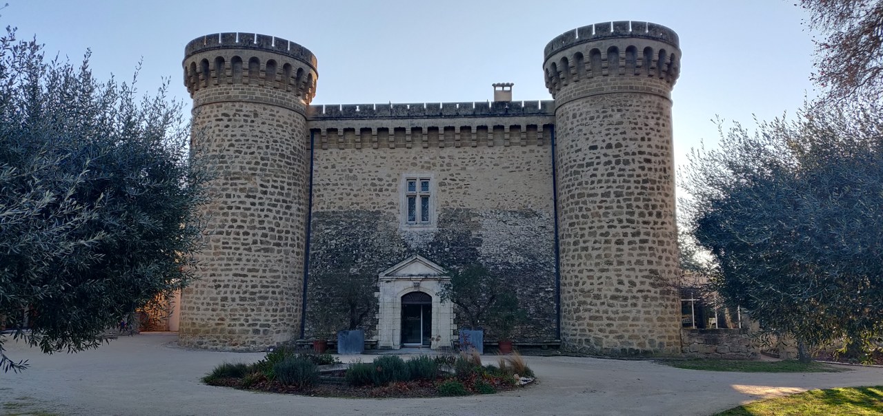 Chateau de Massillan at Uchaux, a sixteenth-century chateau with two crenellated round towers Chateau de Massillan at Uchaux, a sixteenth-century chateau with two crenellated round towers