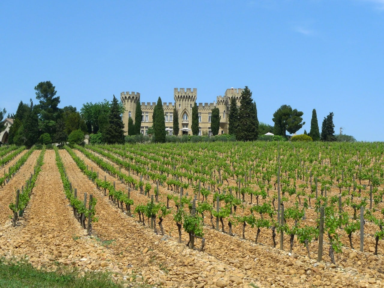 Castle Hotels in Provence: Where You Can Actually Sleep in a Château 1 Chateau des Fines Roches, a neo-medieval chateau hotel above the vineyards of Chateauneuf-du-Pape