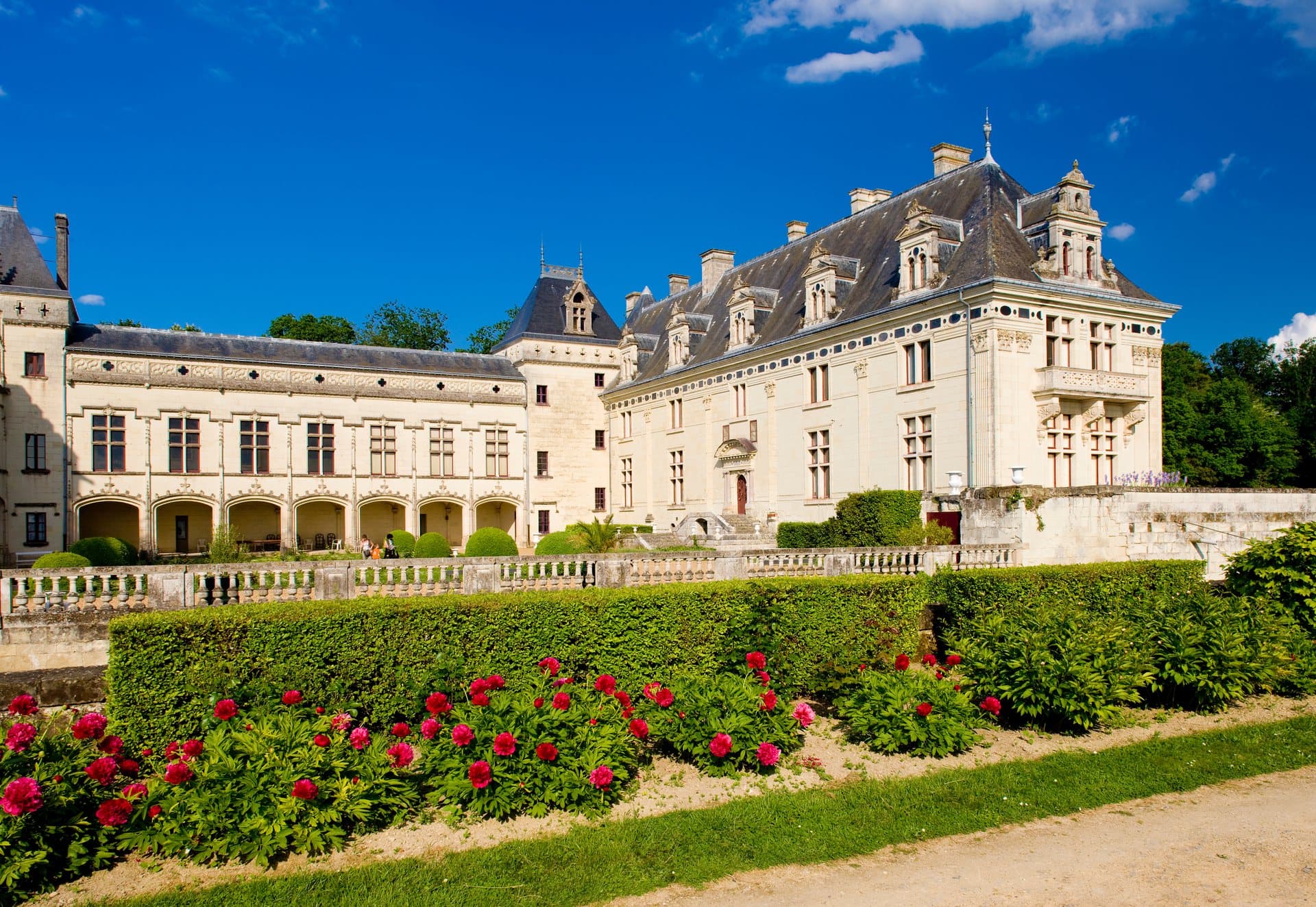 The white tuffeau façade of Château de Brézé