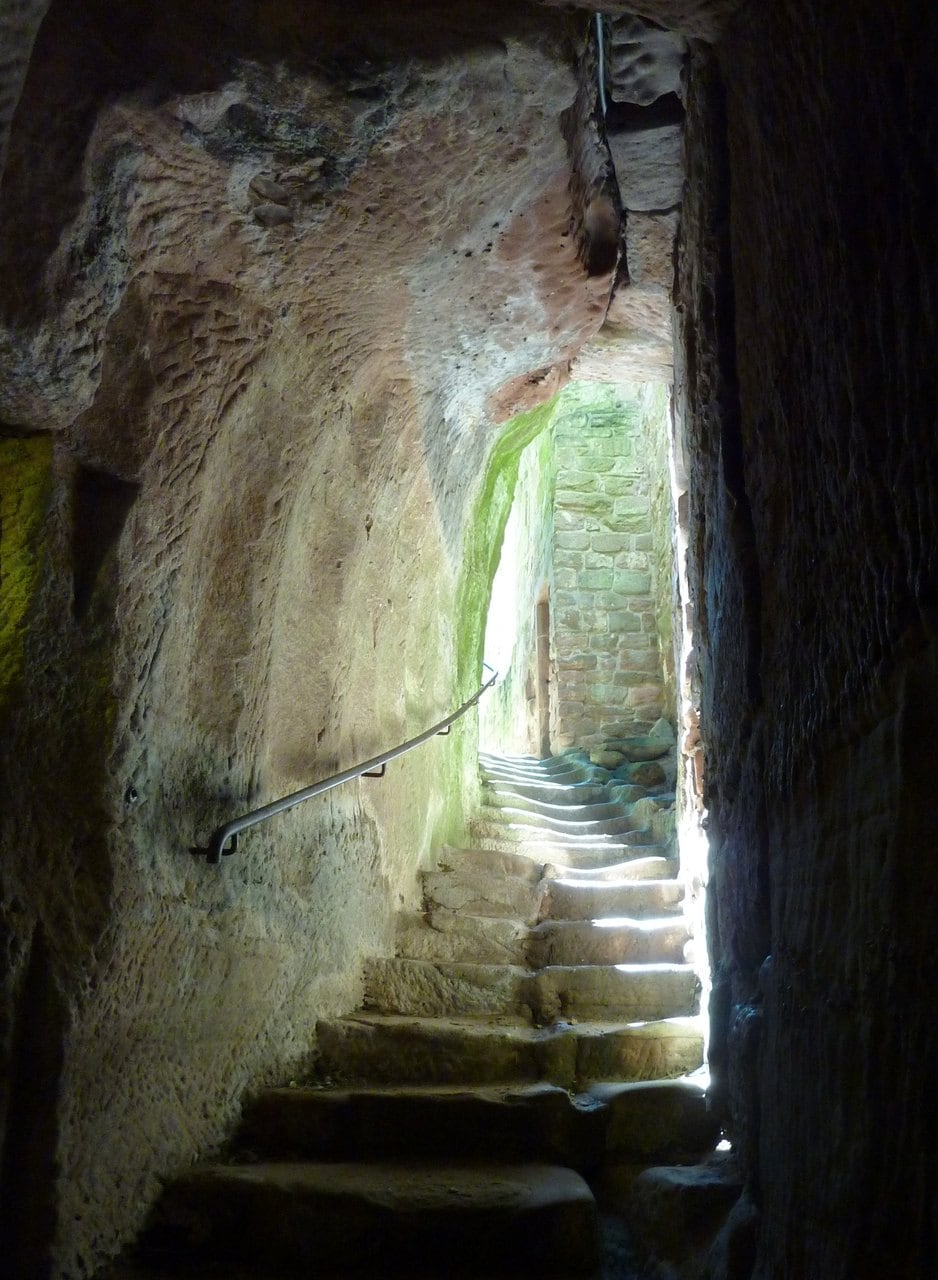 A stairway cut into the sandstone rock inside Château de Fleckenstein A stairway cut into the sandstone rock inside Château de Fleckenstein