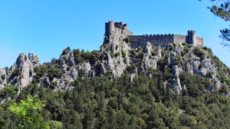 Château de Puilaurens 4 Château de Puilaurens on its wooded limestone crag above the Fenouillèdes