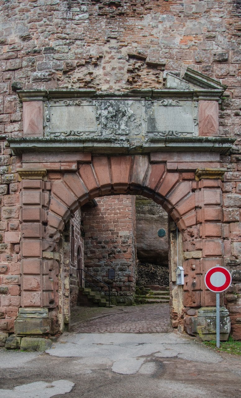 Renaissance portal of Bishop Jean de Manderscheid at Château du Haut-Barr with Latin inscription Renaissance portal of Bishop Jean de Manderscheid at Château du Haut-Barr with Latin inscription