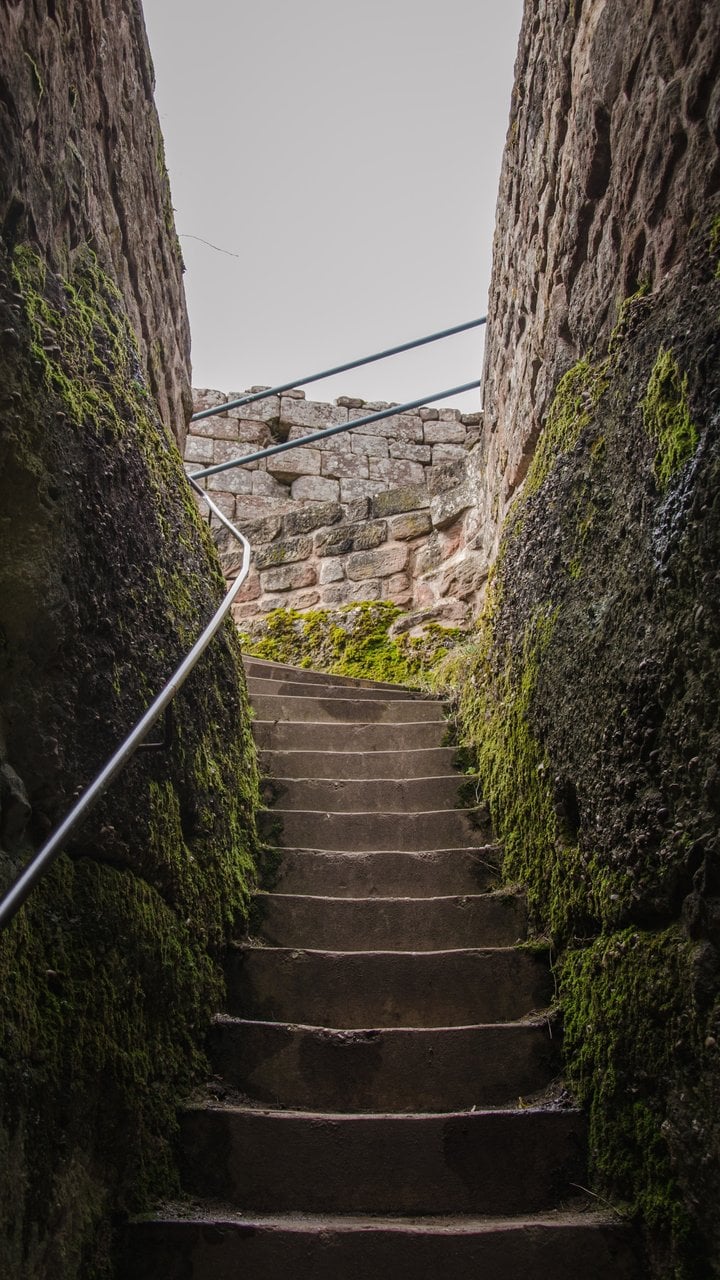 Narrow stairway between rock and masonry at Château du Haut-Barr Narrow stairway between rock and masonry at Château du Haut-Barr