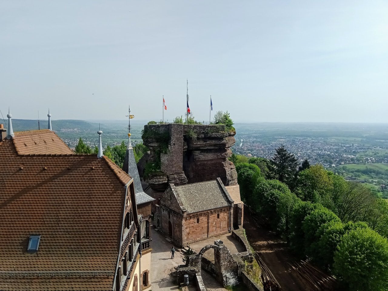 View from the keep rock of Château du Haut-Barr over the chapel, the 1901 restaurant, and Saverne View from the keep rock of Château du Haut-Barr over the chapel, the 1901 restaurant, and Saverne
