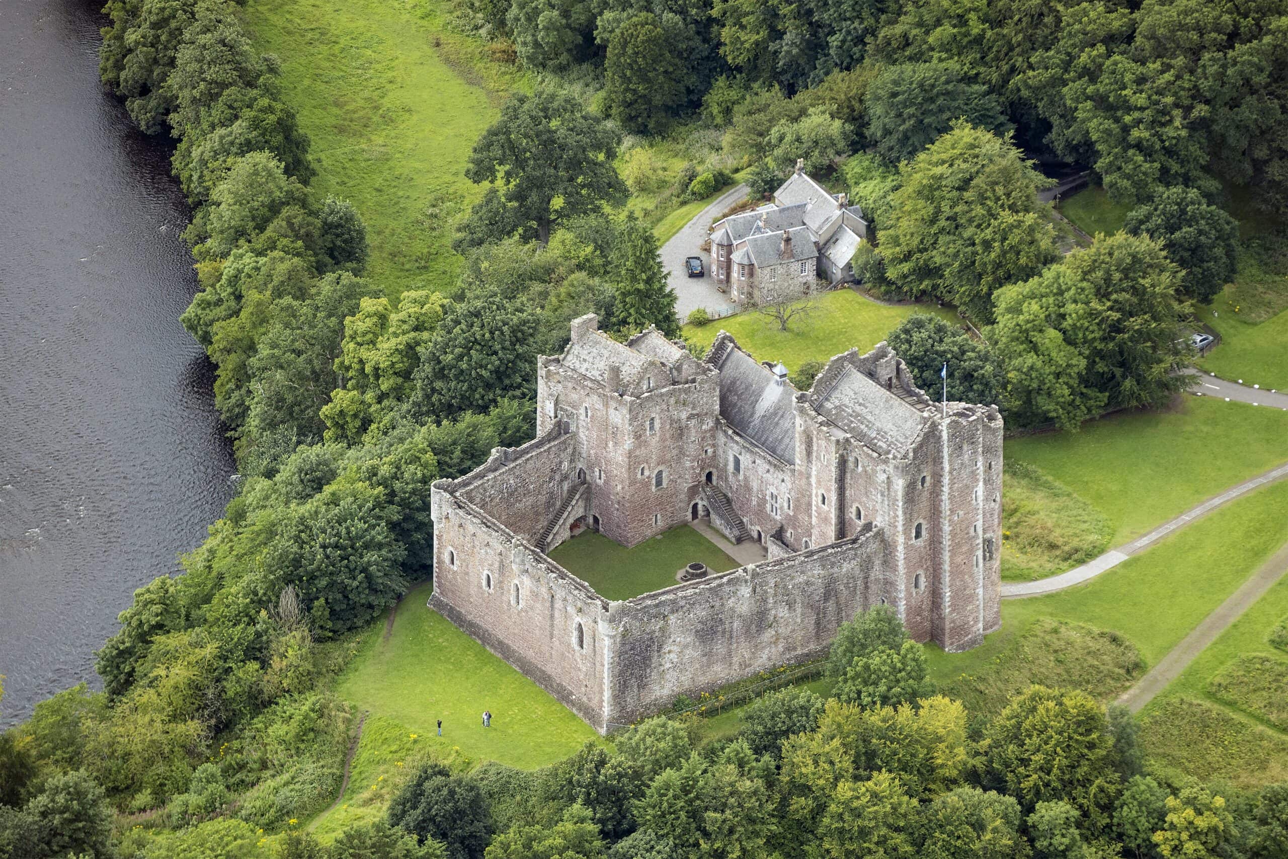 Aerial view of Doune Castle showing the gatehouse tower and great-hall range around the courtyard