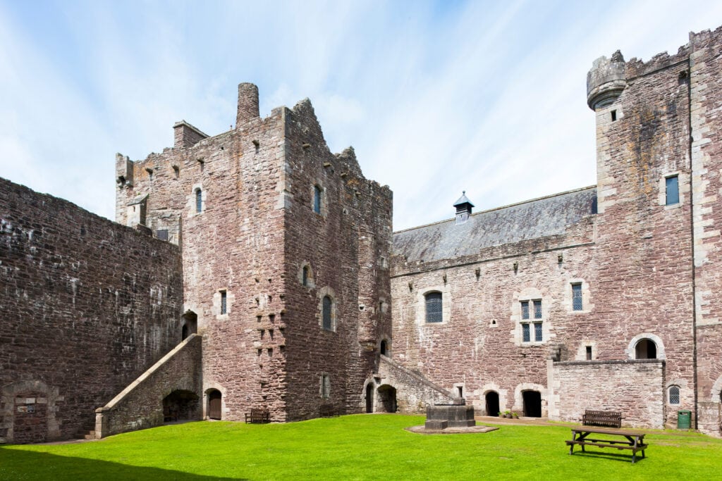 The sunlit courtyard of Doune Castle