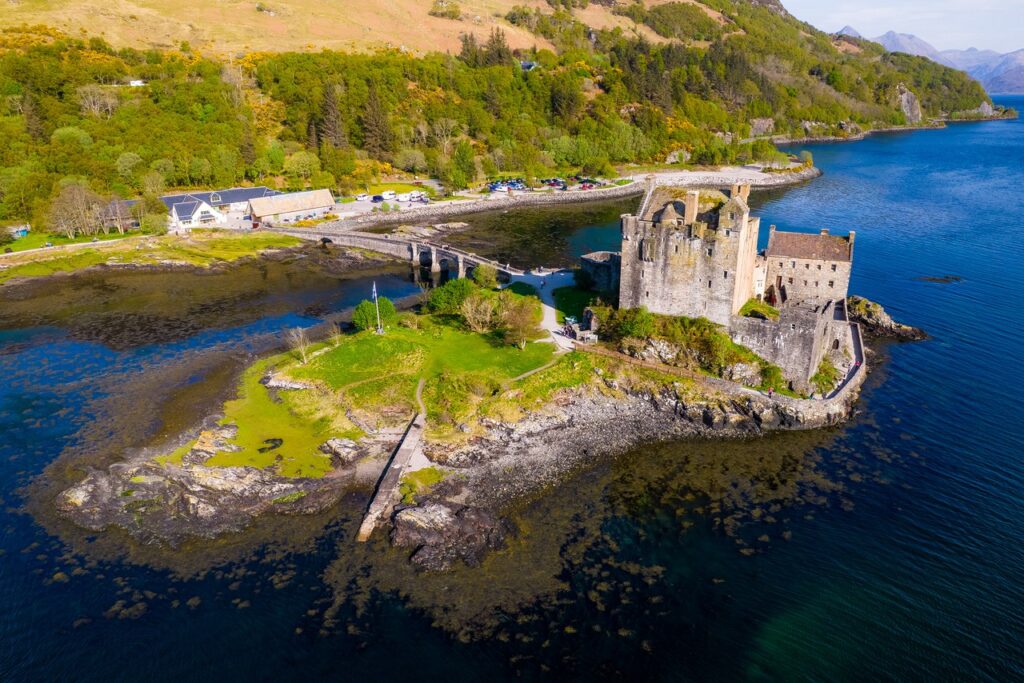 Eilean Donan Castle 11 An aerial view over Loch Duich sets Eilean Donan on its tidal islet, linked to the Dornie shore by its arched stone bridge.