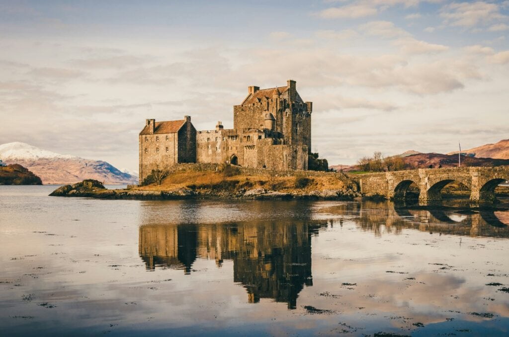 Eilean Donan Castle 10 Golden evening light and snow-dusted peaks frame Eilean Donan's reflection across a still Loch Duich.