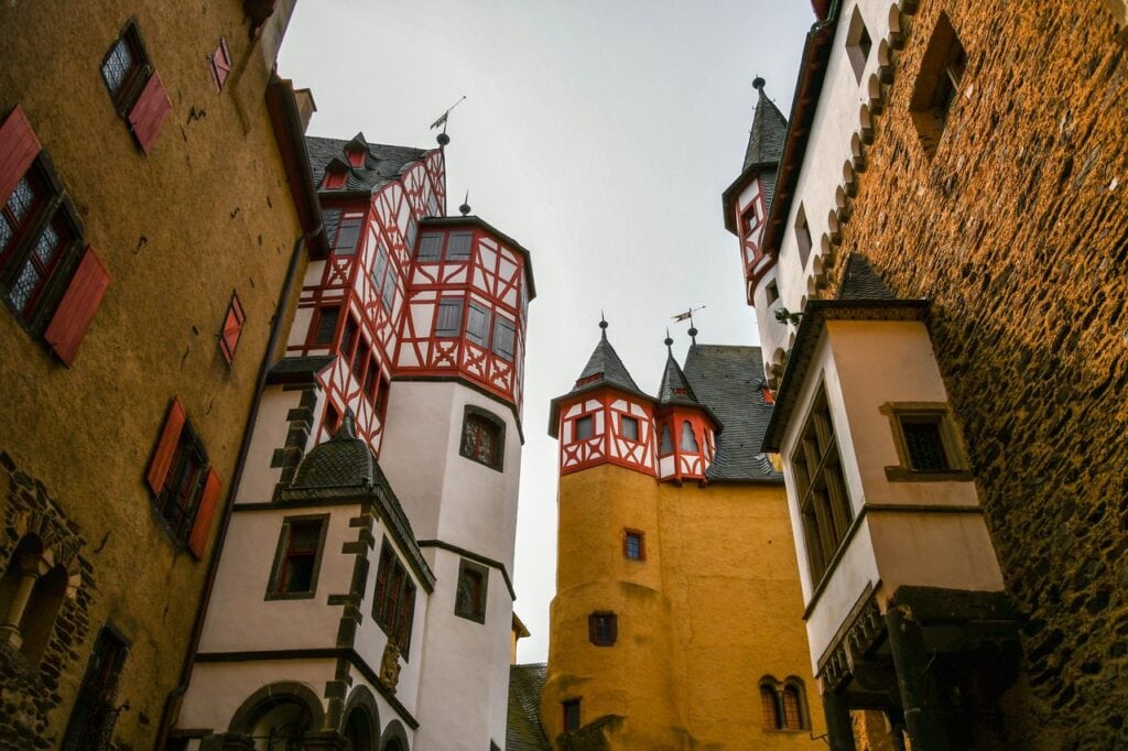 The named tower-houses of Burg Eltz pressed together over the narrow inner courtyard