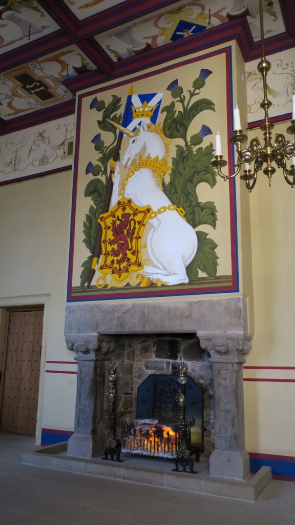 Stirling Castle 10 A re-created palace chamber, its stone fireplace crowned by the painted royal unicorn of Scotland.
