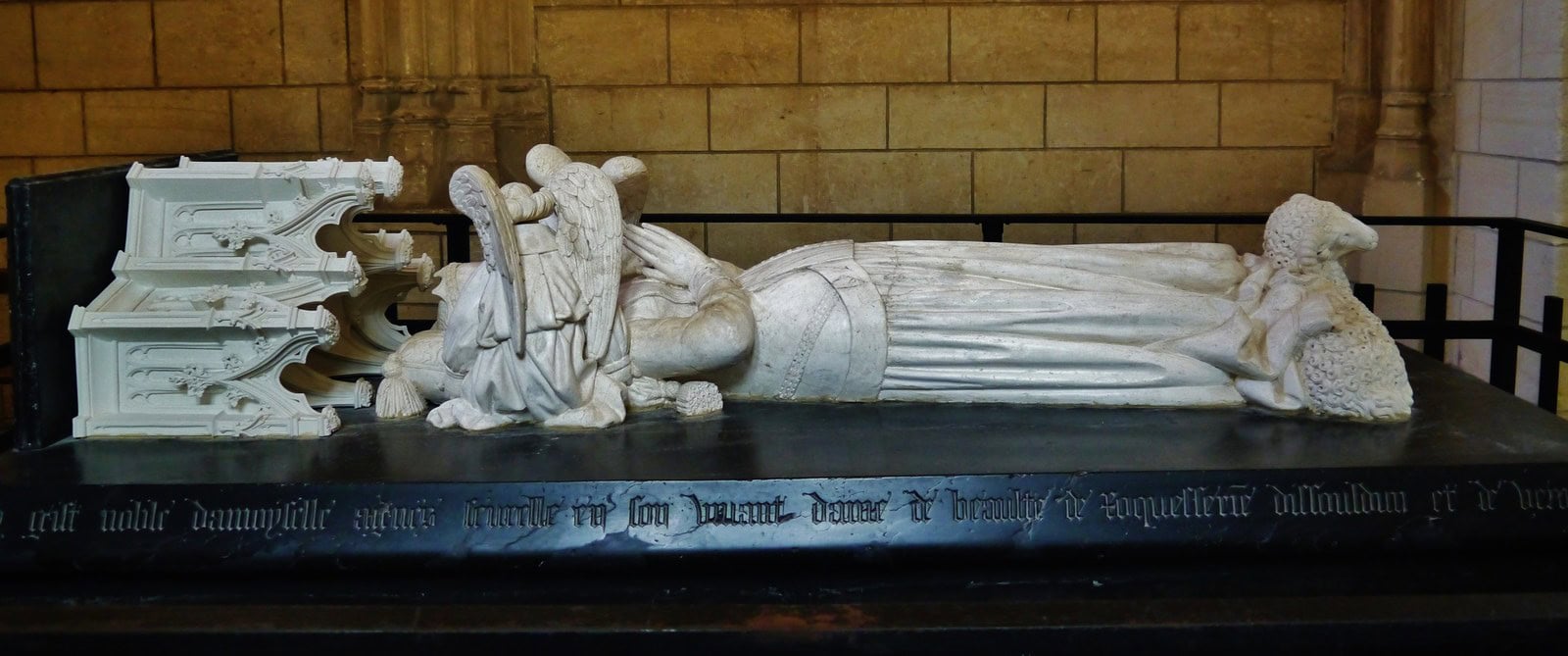 The white marble recumbent tomb effigy of Agnes Sorel in the Collegiale Saint-Ours at Loches, two lambs at her feet. The white marble recumbent tomb effigy of Agnes Sorel in the Collegiale Saint-Ours at Loches, two lambs at her feet.