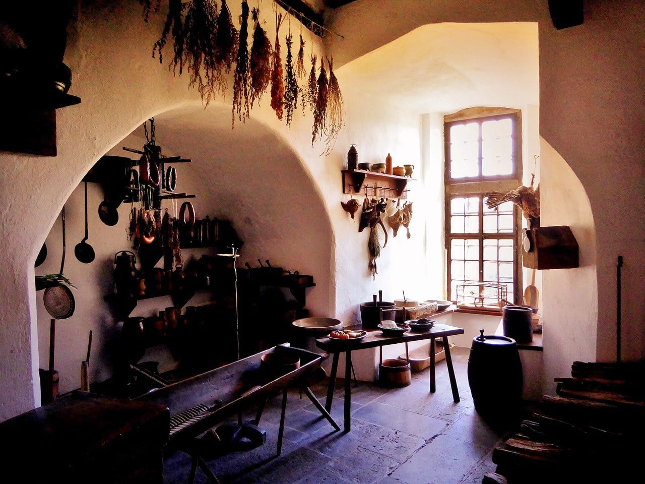Marksburg's castle kitchen with its arched hearth and bunches of dried herbs