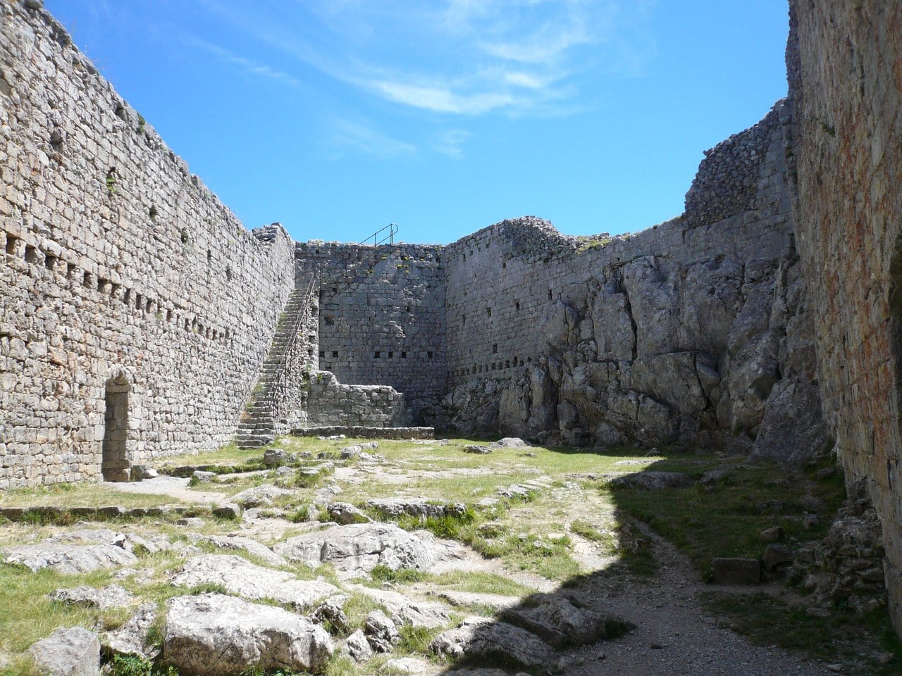 Inside the roofless enceinte of the royal fortress of Montségur Inside the roofless enceinte of the royal fortress of Montségur