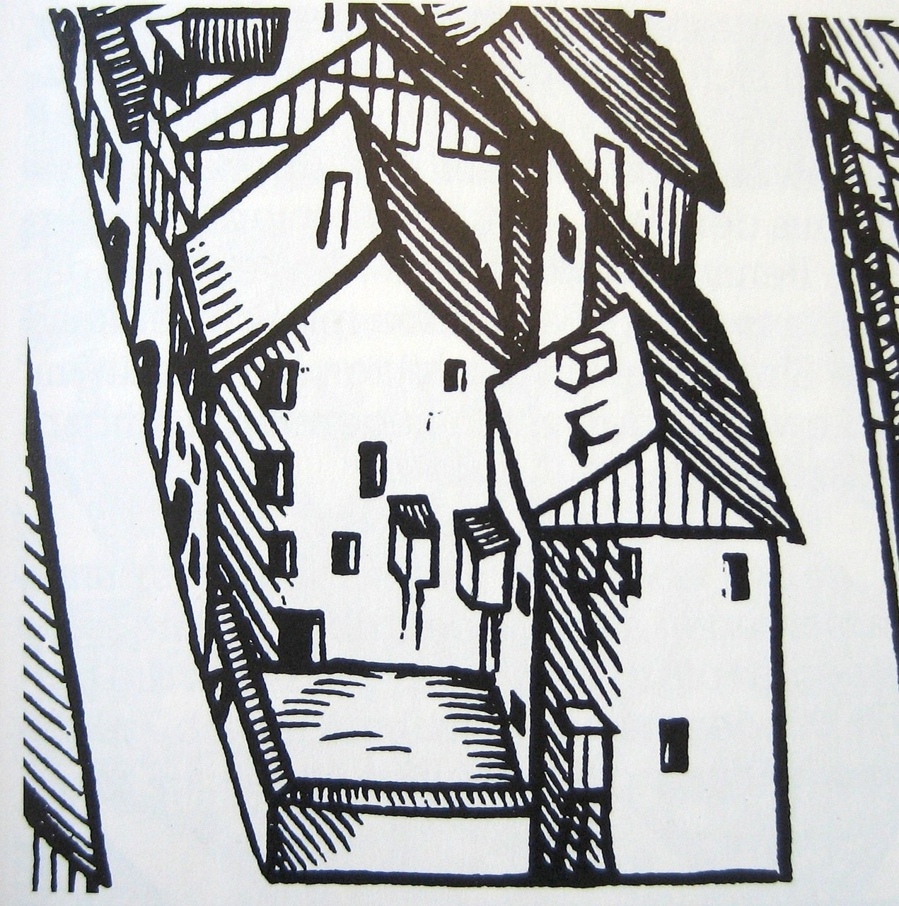 A woodcut bird's-eye view of tall gabled town houses around a small enclosed yard, with several small boxed structures projecting from the upper walls over the yard. A woodcut bird's-eye view of tall gabled town houses around a small enclosed yard, with several small boxed structures projecting from the upper walls over the yard.
