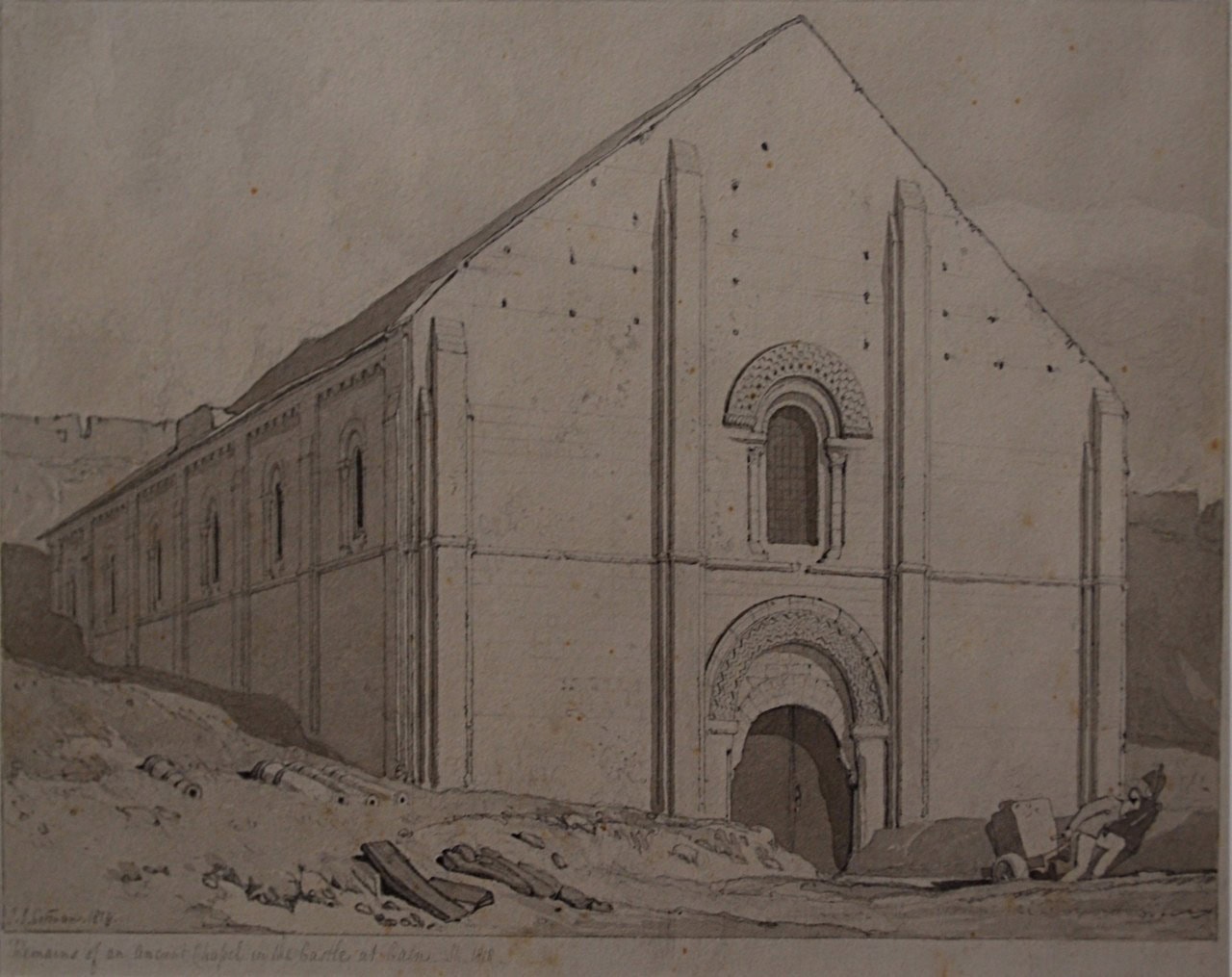 A graphite and wash drawing by John Sell Cotman of the Salle de l'Échiquier at Caen, its long buttressed flank and richly carved round-arched doorway rising from a bank of rubble, with a figure pushing a two-wheeled handcart at the right. A graphite and wash drawing by John Sell Cotman of the Salle de l'Échiquier at Caen, its long buttressed flank and richly carved round-arched doorway rising from a bank of rubble, with a figure pushing a two-wheeled handcart at the right.