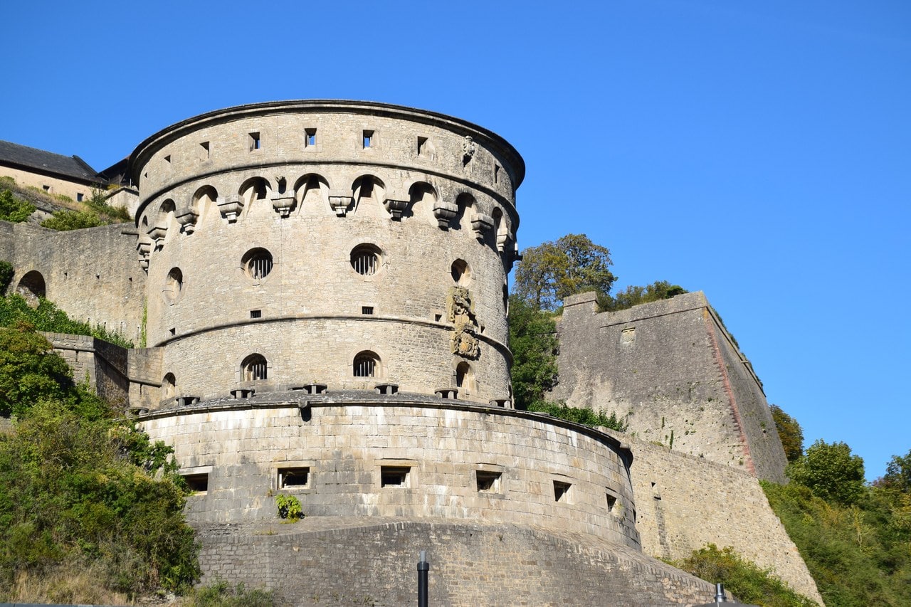 The round Maschikuliturm at Marienberg Fortress, its upper stage carried on a corbelled machicolation gallery above two tiers of circular gun ports, standing on a revetted battery built out from the rock. The round Maschikuliturm at Marienberg Fortress, its upper stage carried on a corbelled machicolation gallery above two tiers of circular gun ports, standing on a revetted battery built out from the rock.