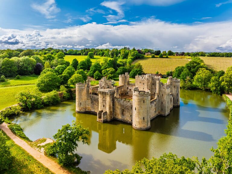Home 6 Bodiam Castle standing in its wide rectangular moat, seen from the air above the Rother valley
